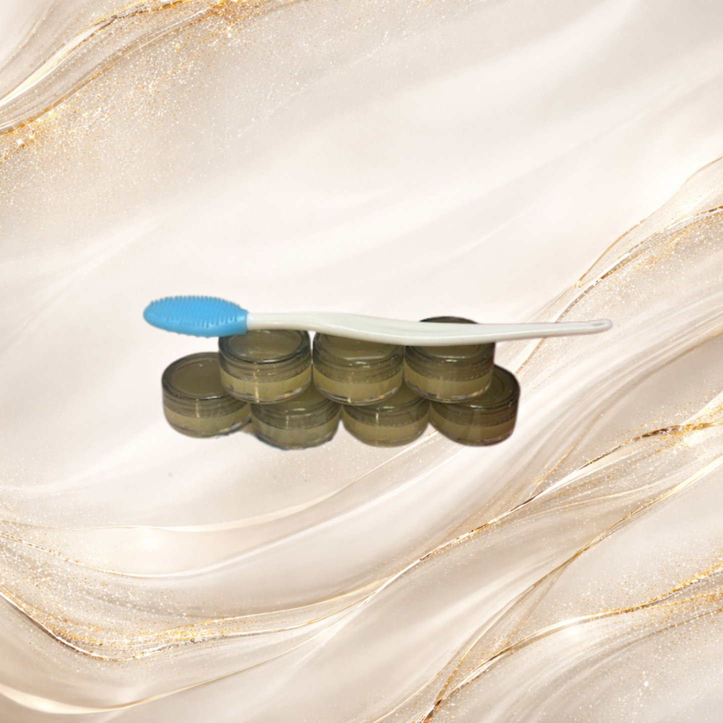 Small jar of Deep Cold™ lip scrub with smooth, creamy texture, designed to exfoliate and soften lips.