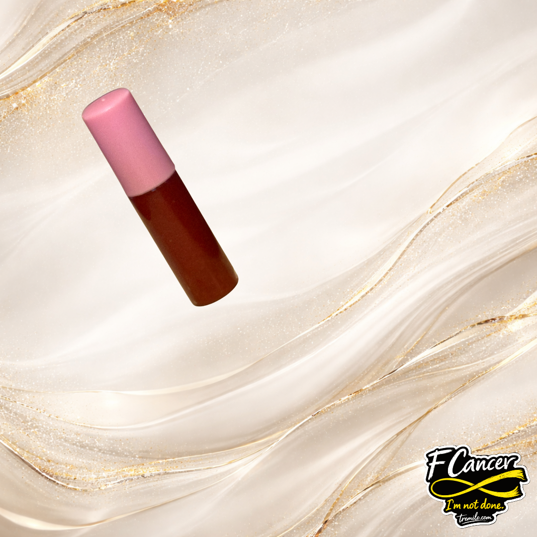 F CANCER lip gloss by Tremilo in soft pink cap tube — bold red statement shade