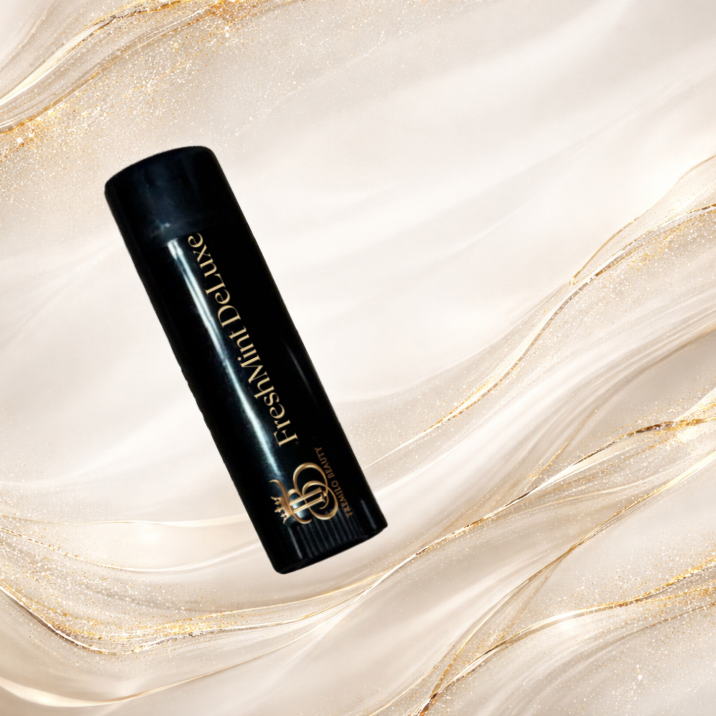 Sleek black tube of FreshMint DeLuxe™ Lip Balm by Tremilo Beauty, enriched with nourishing ingredients for smooth, hydrated lips.