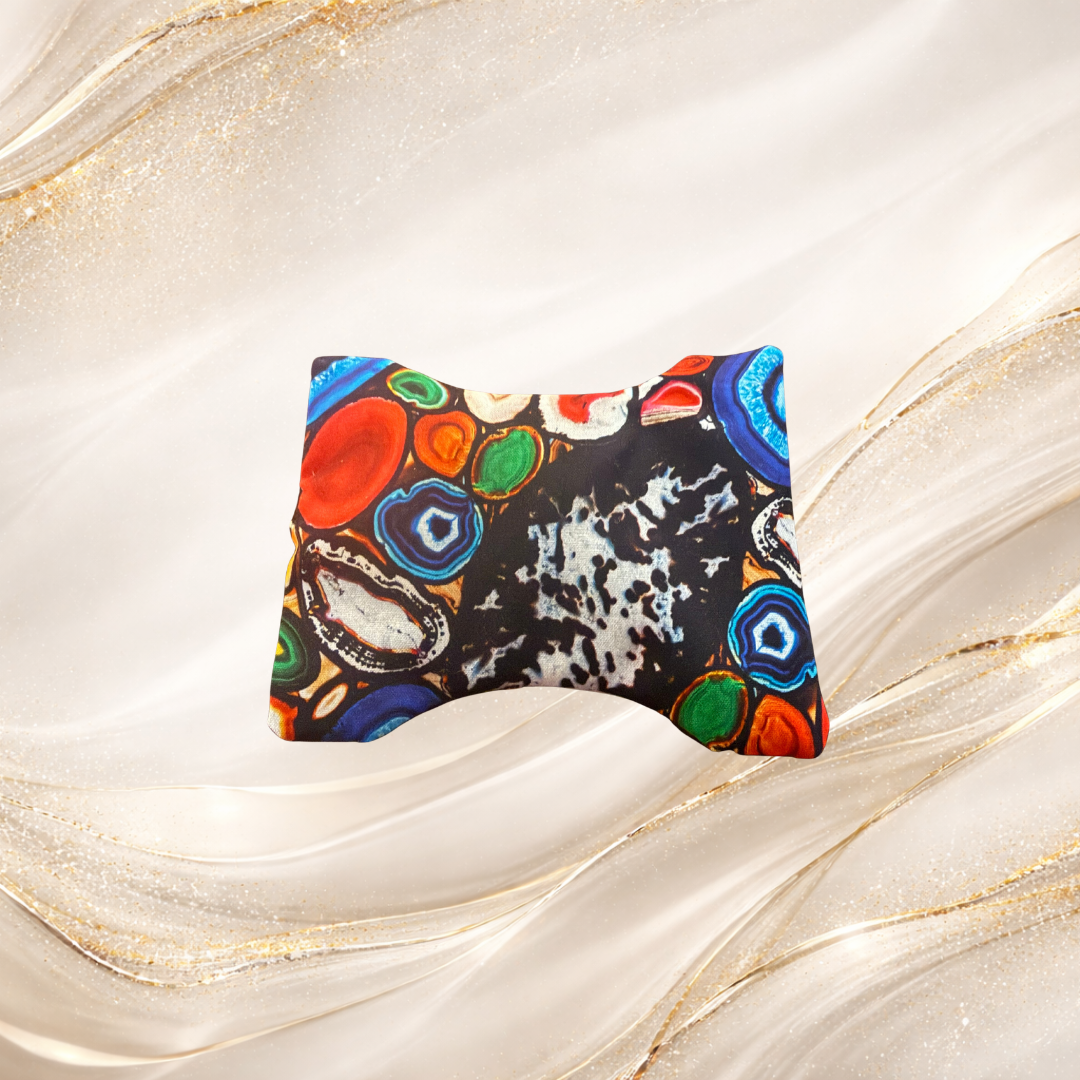 Small Palm & Pulse™ Comfort Compress featuring a stone current pattern in earthy tones, filled with premium buckwheat hulls for soothing warmth or cool relief.