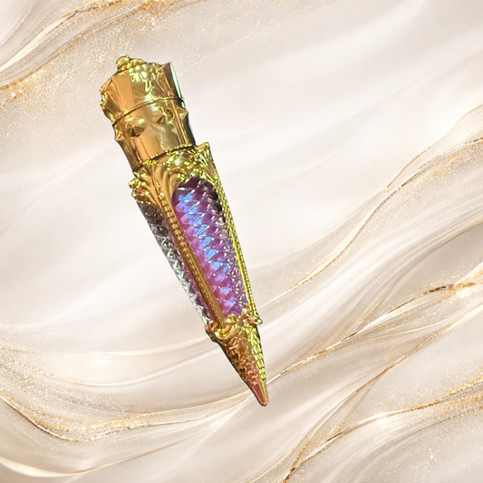Violet Confluence purple shimmer lip gloss in ornate gold claw tube – Tremilo Beauty