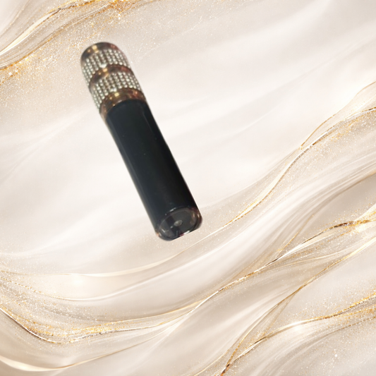 Iron City Ink sheer black lip gloss tube with gold cap from Tremilo Steel City Gloss Collection