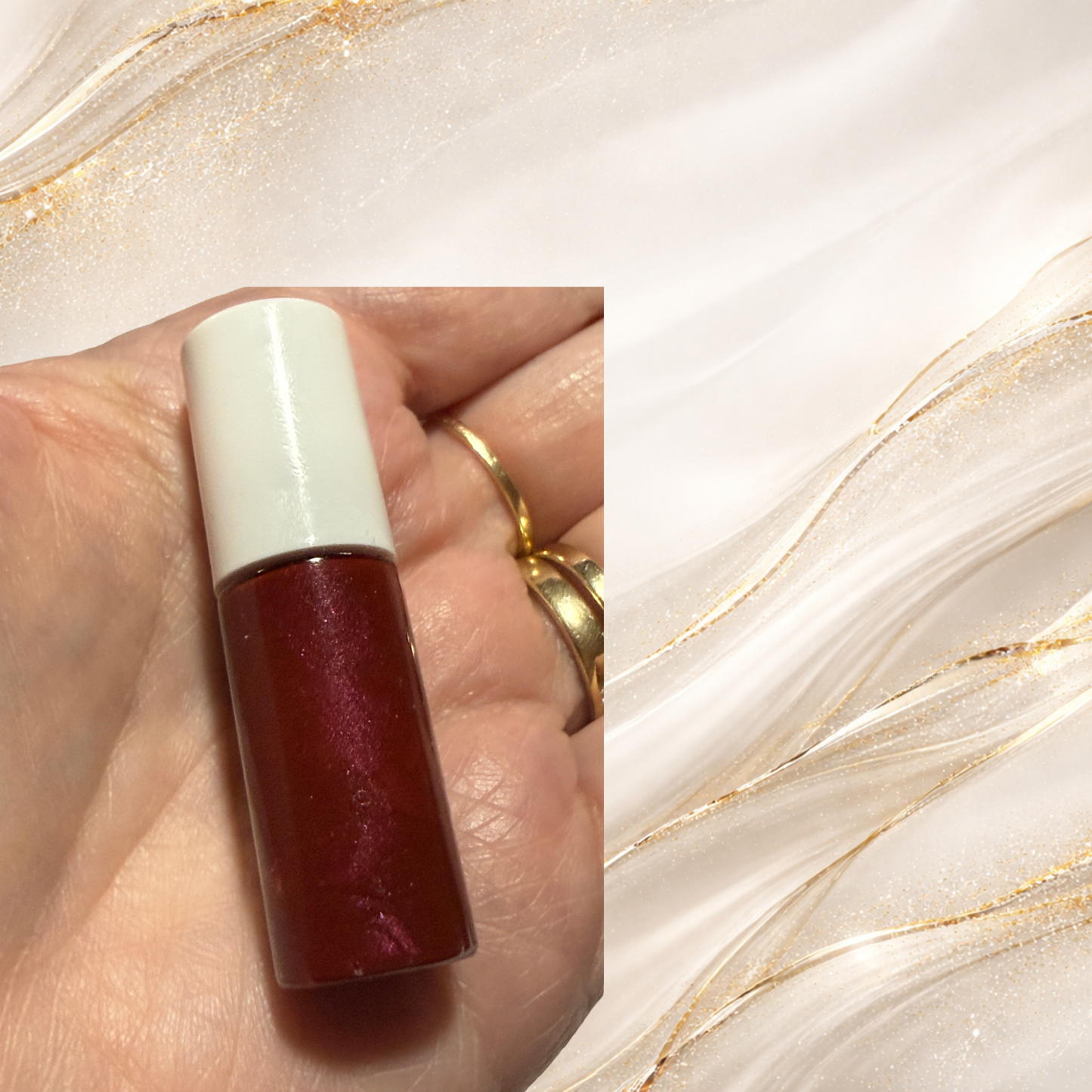 mourningwould-mini-gloss-tube-hand-closeup