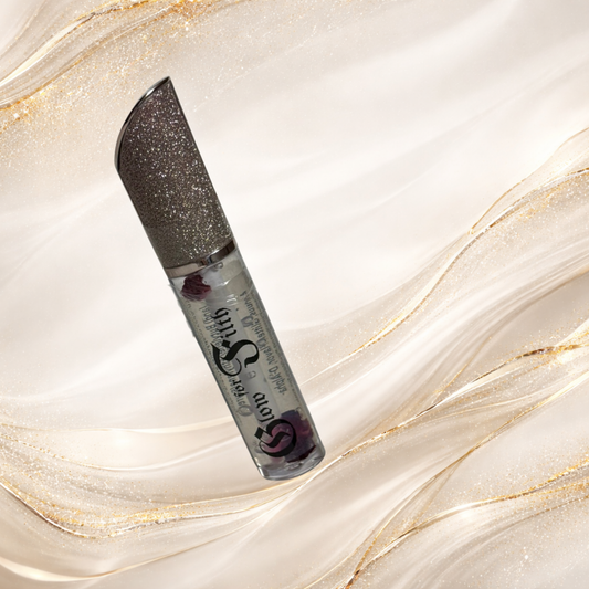 Phreak™ pH-reactive color-changing lip gloss with shimmer and clear base in tube by Glow for Filth.