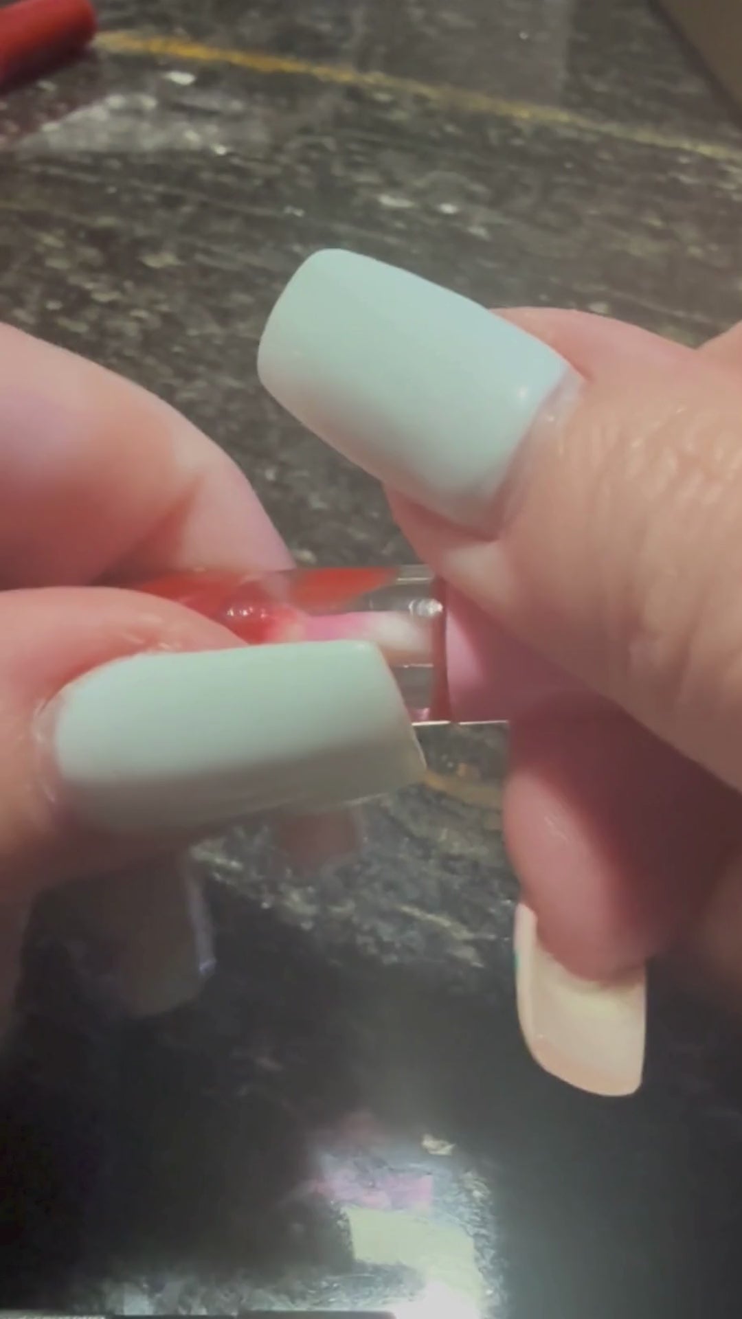 F Cancer lip gloss video by Tremilo Beauty featuring rich red shade and message of support for cancer patients