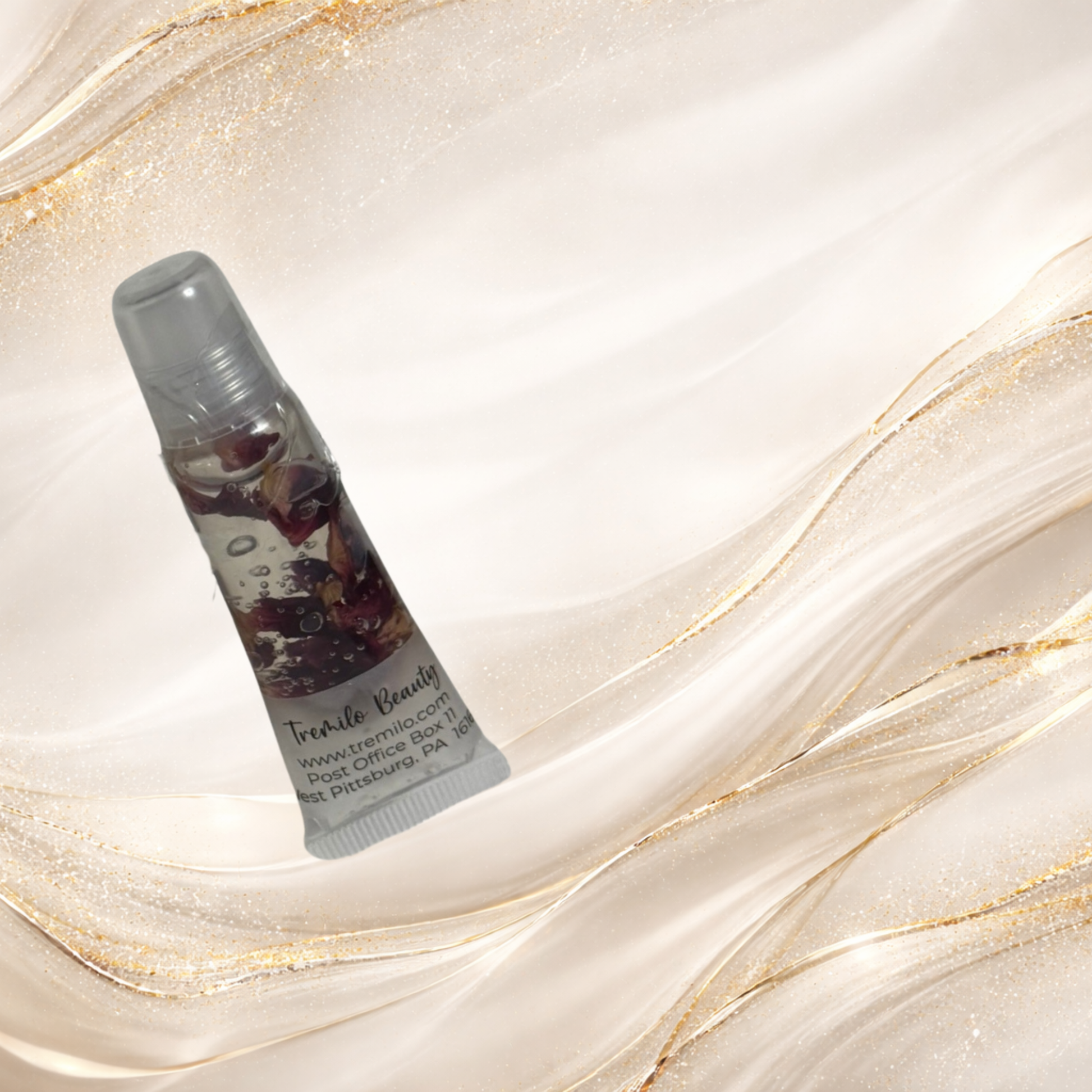 Rose Velvet Cake™ Jelly Lip Gloss in 10 ml squeeze tube showing floating real edible dried rose petals