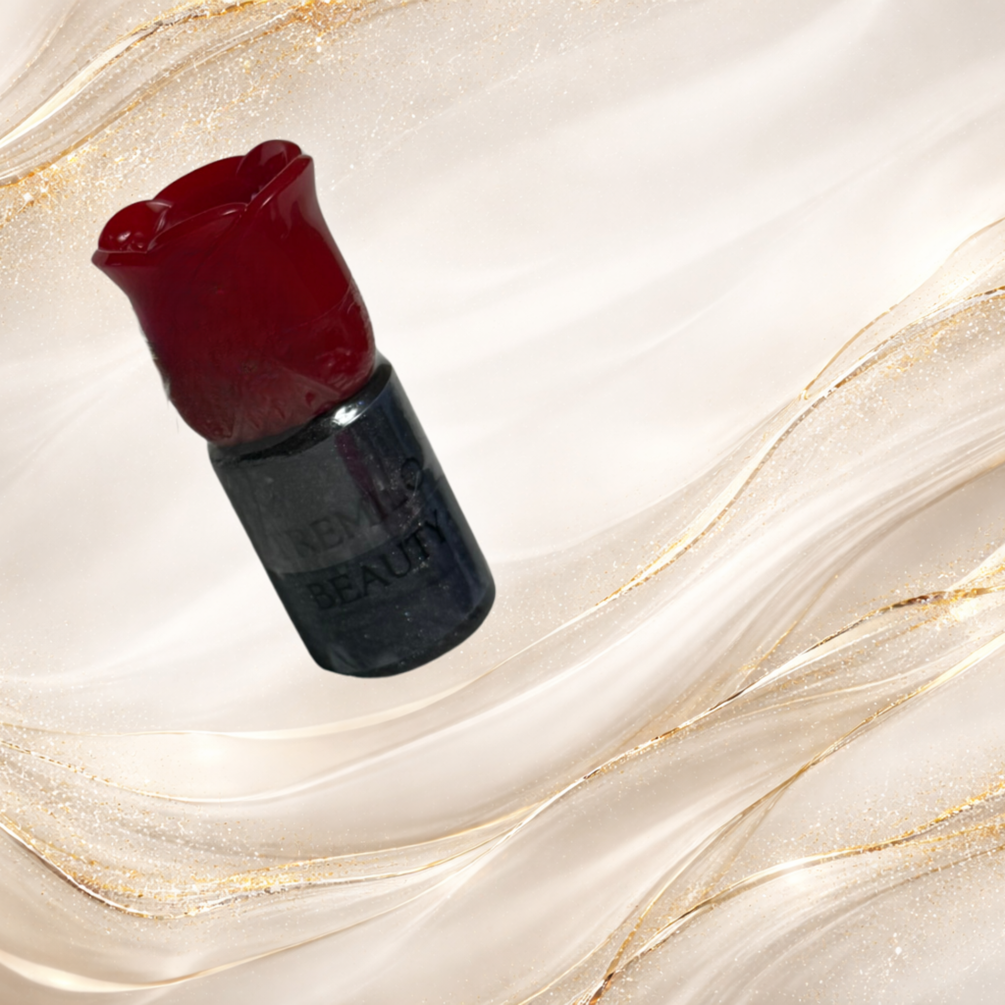 Black Gold Gloss lip gloss in red rose tube packaging from Tremilo Beauty