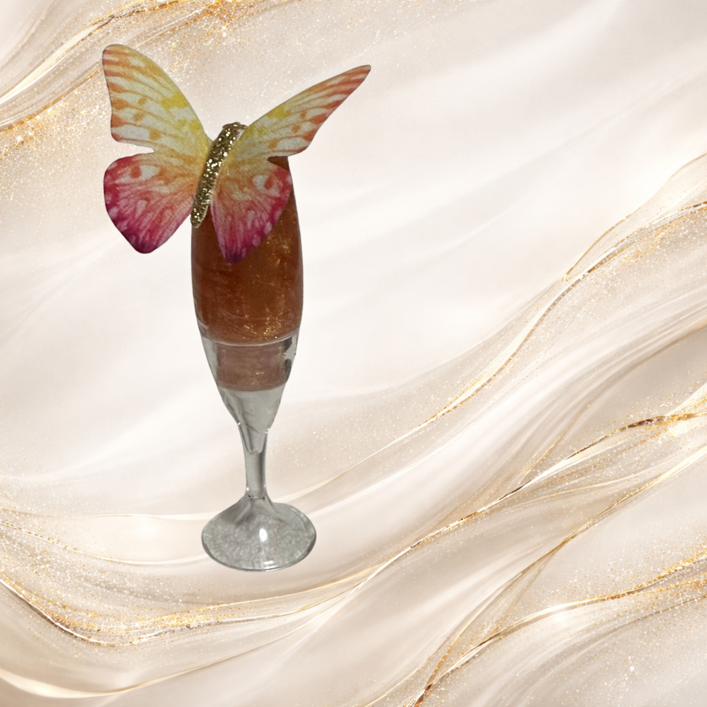 Champagne Kiss lip gloss in champagne glass tube with butterfly topper by Tremilo Beauty