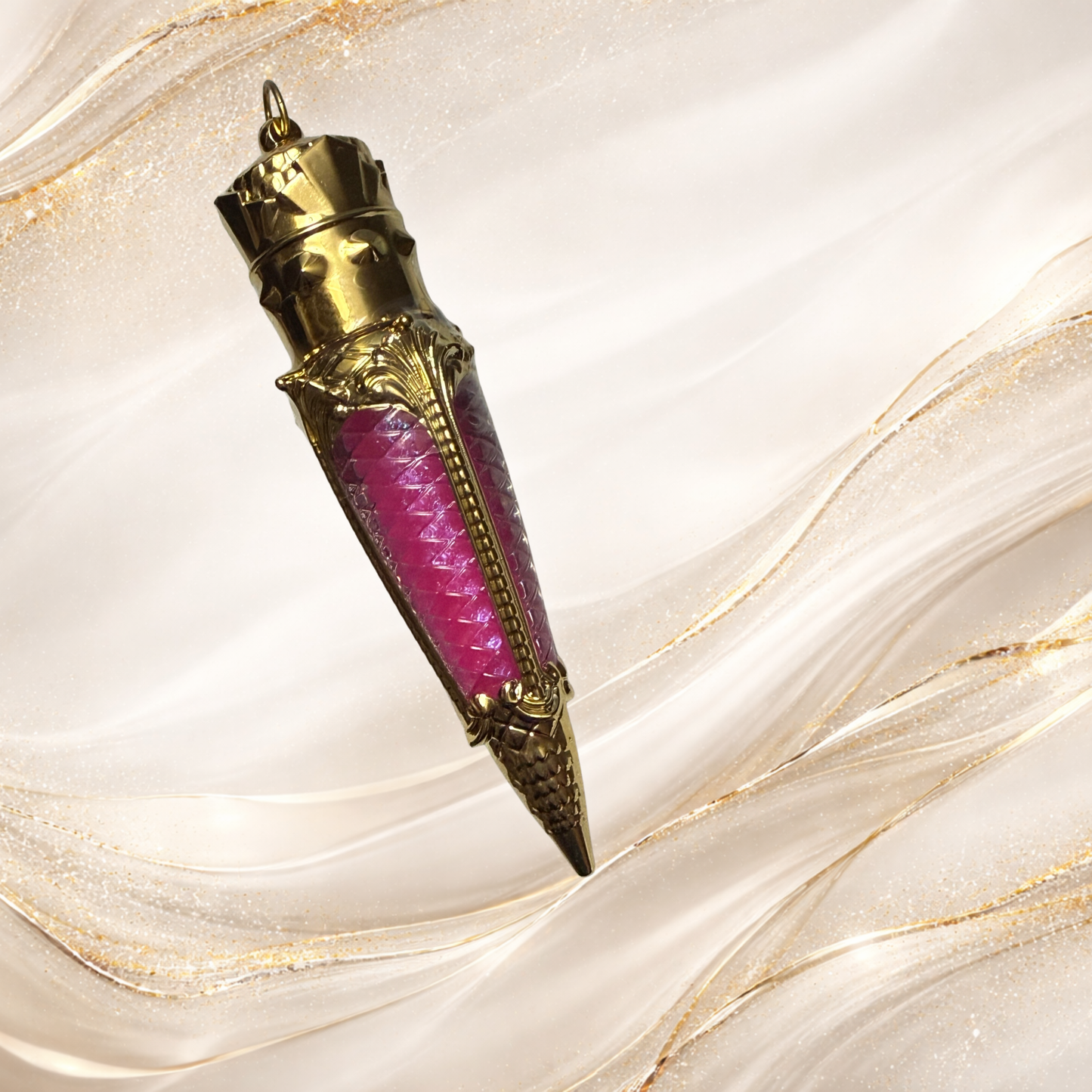 Tremilo South Side Pop lip gloss in gold claw tube with vibrant pink shimmer formula