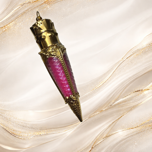 Tremilo South Side Pop lip gloss in gold claw tube with vibrant pink shimmer formula