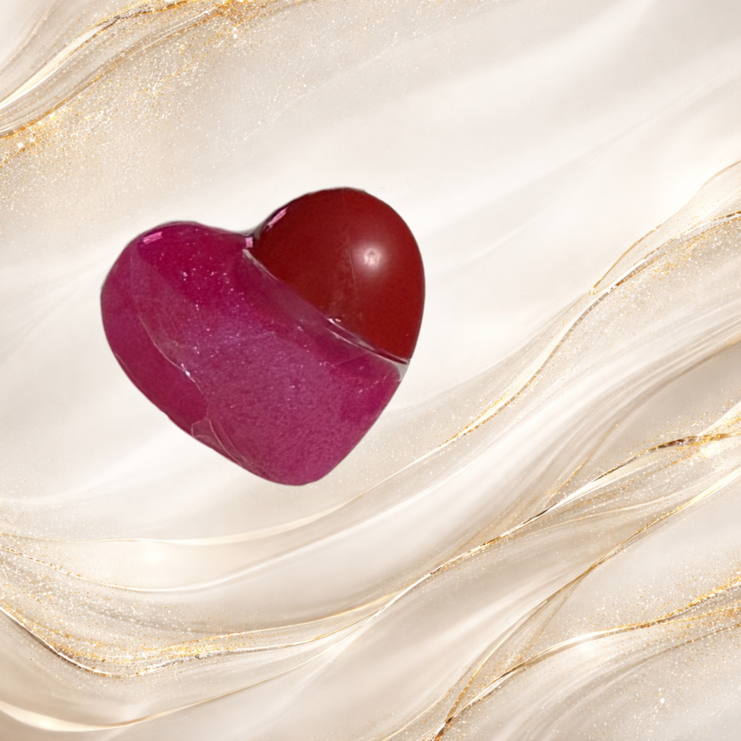 Tremilo South Side Pop lip gloss in heart-shaped tube with vibrant pink shimmer gloss