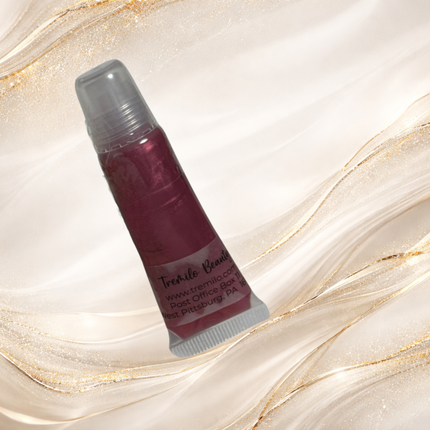 Three Rivers Rose lip gloss from Tremilo Beauty in squeeze tube with rose pink shimmer finish