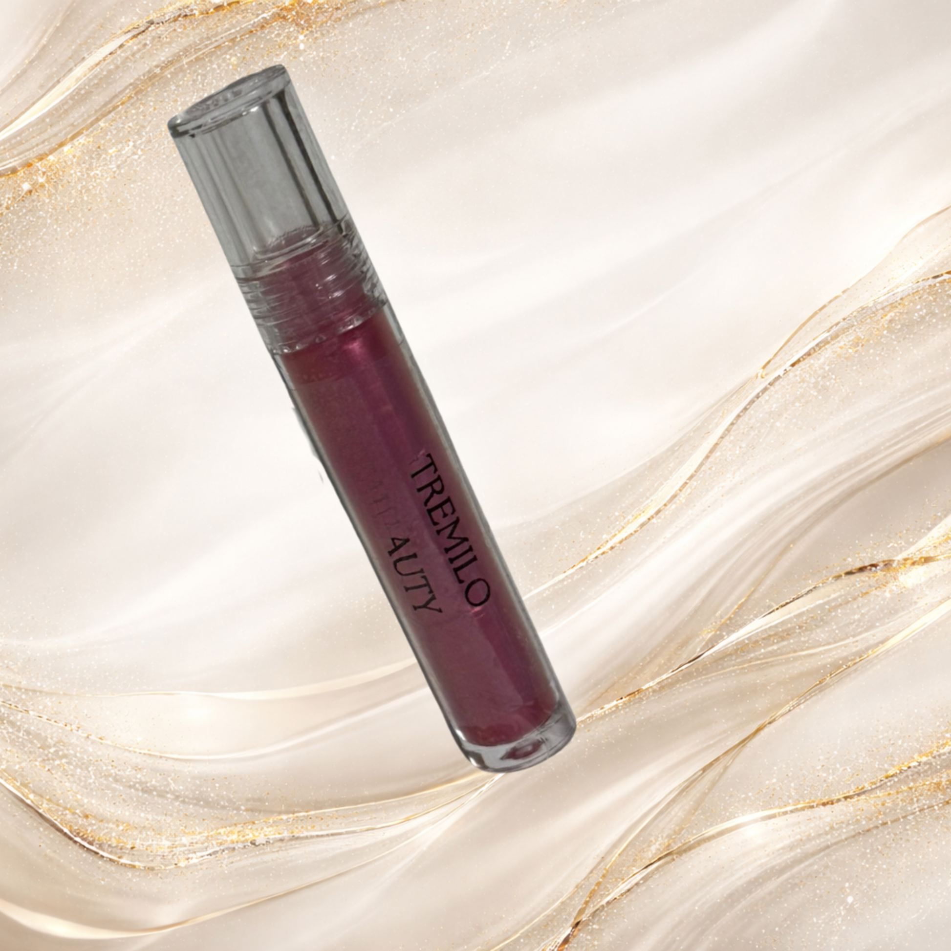 Three Rivers Rose lip gloss from Tremilo Beauty with rose pink shimmer in clear gloss tube
