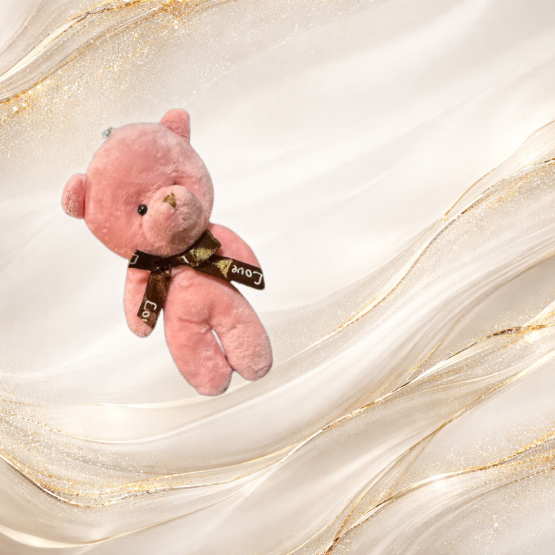 rose pink teddy bear charm with decorative ribbon